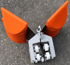 Enviro-USA™ tidal compensator with high-visibility orange floats and stainless steel roller assembly designed to help turbidity curtains and floating barriers adjust to changing water levels and tidal conditions.